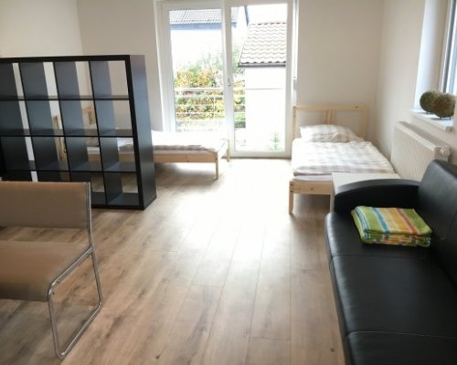 Ferienwohnung mit getrennten Betten und Balkon