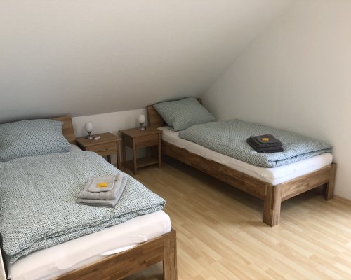 Zweibettzimmer mit getrennten Betten