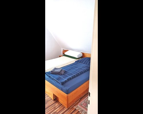 Schlafzimmer mit Doppelbett